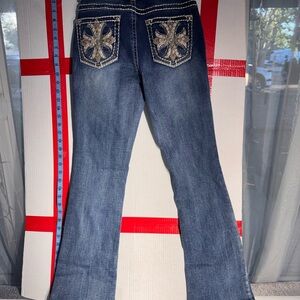 Stylish Blue Boot Cut Jeans with Embellished Pockets Size 1